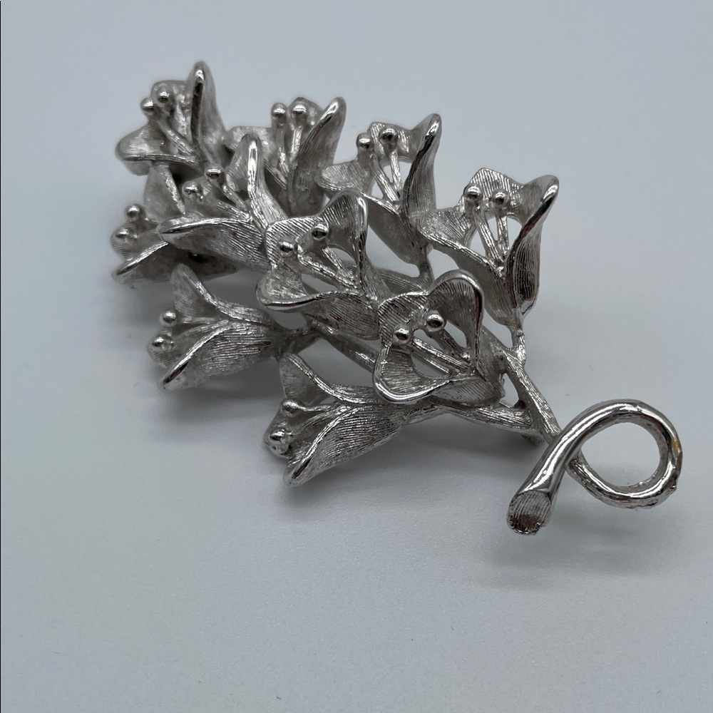 Elegant Silver Floral Brooch